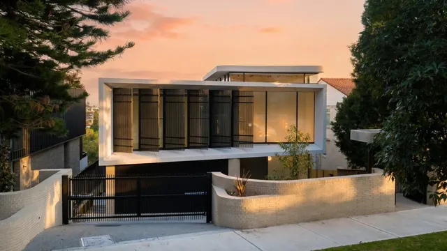 Architecturally designed new home at dusk