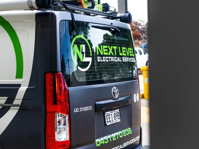 Next Level Electrical van signage and contact details
